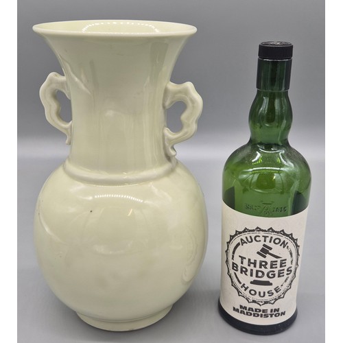 171 - Chinese Celadon Vase with paper stamp to base. 29cm in height.