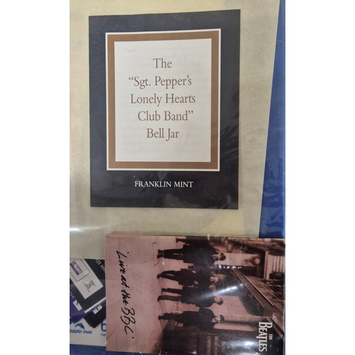 199 - Selection of The Beatles collectables; Framed miniature replicas of guitars and drum, brick fragment... 