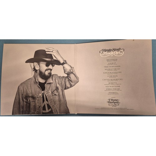 199 - Selection of The Beatles collectables; Framed miniature replicas of guitars and drum, brick fragment... 