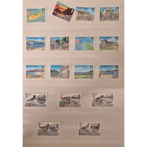 226 - Tray of seven stamp albums containing Guernsey stamps.