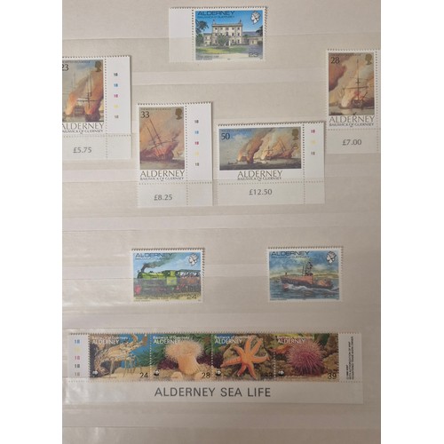 226 - Tray of seven stamp albums containing Guernsey stamps.