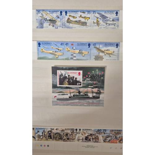 226 - Tray of seven stamp albums containing Guernsey stamps.