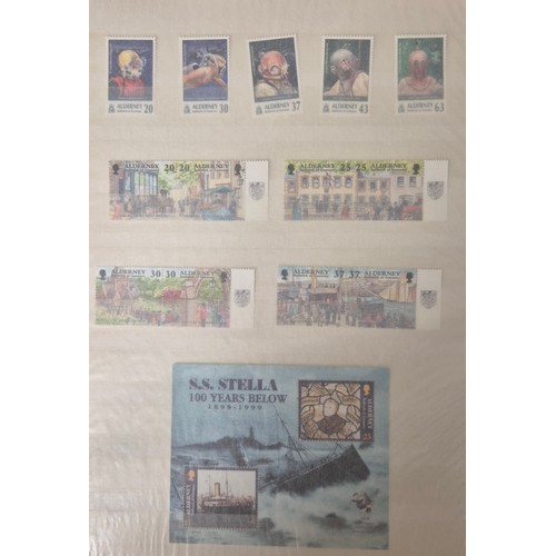 226 - Tray of seven stamp albums containing Guernsey stamps.