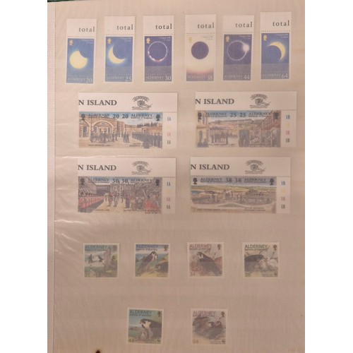 226 - Tray of seven stamp albums containing Guernsey stamps.