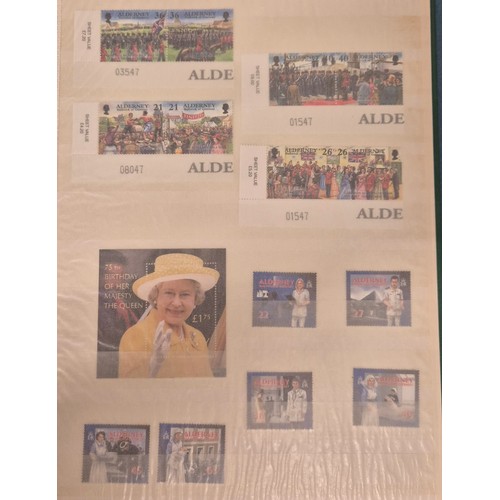 226 - Tray of seven stamp albums containing Guernsey stamps.