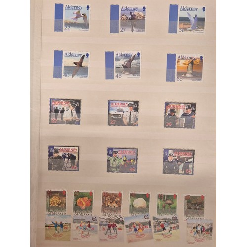 226 - Tray of seven stamp albums containing Guernsey stamps.