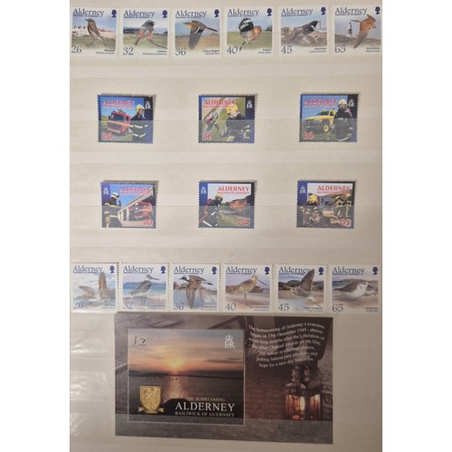 226 - Tray of seven stamp albums containing Guernsey stamps.