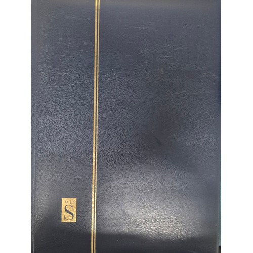 226 - Tray of seven stamp albums containing Guernsey stamps.