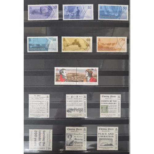 226 - Tray of seven stamp albums containing Guernsey stamps.