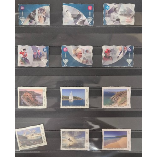 226 - Tray of seven stamp albums containing Guernsey stamps.