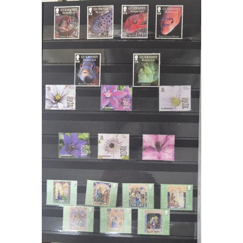 226 - Tray of seven stamp albums containing Guernsey stamps.