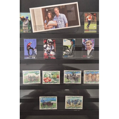 226 - Tray of seven stamp albums containing Guernsey stamps.