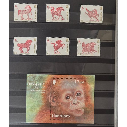 226 - Tray of seven stamp albums containing Guernsey stamps.