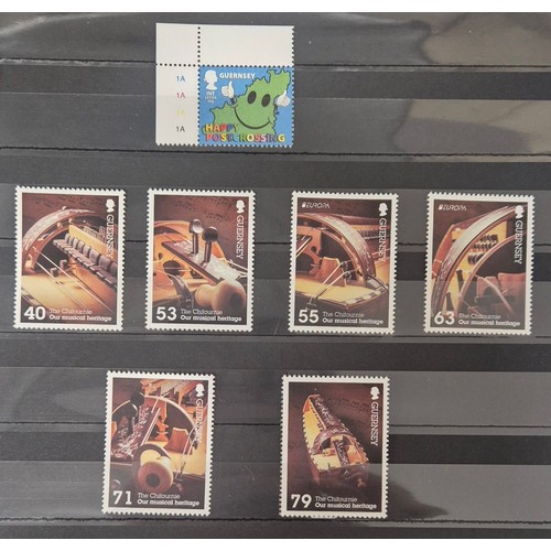 226 - Tray of seven stamp albums containing Guernsey stamps.