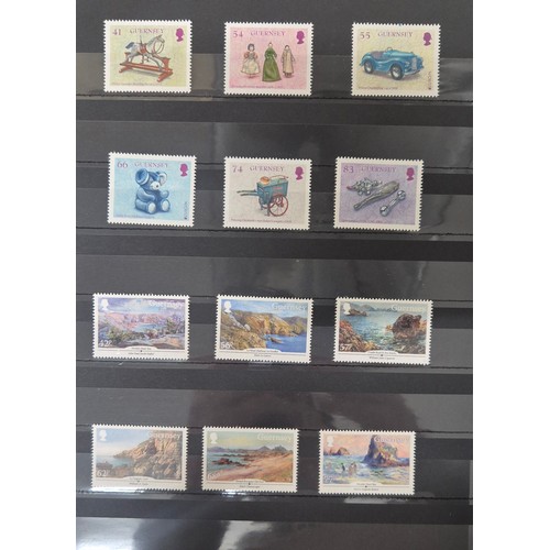 226 - Tray of seven stamp albums containing Guernsey stamps.