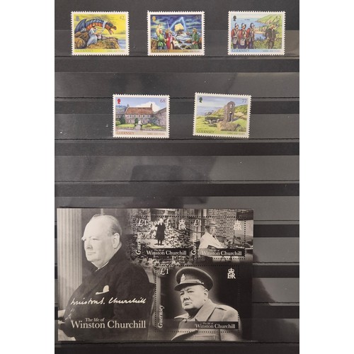 226 - Tray of seven stamp albums containing Guernsey stamps.