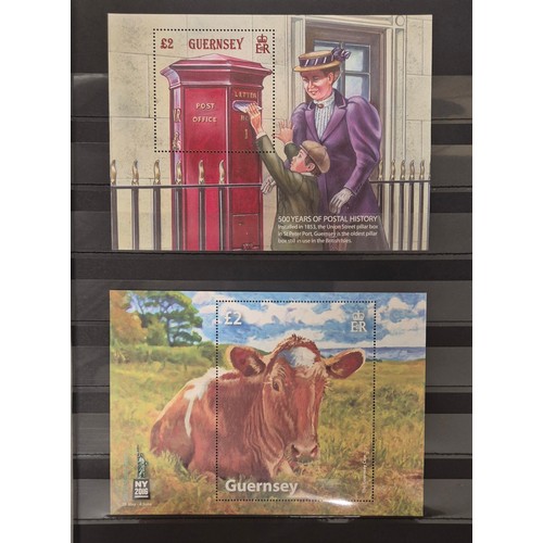 226 - Tray of seven stamp albums containing Guernsey stamps.