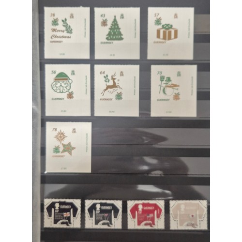 226 - Tray of seven stamp albums containing Guernsey stamps.