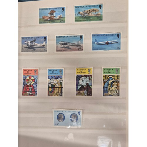 226 - Tray of seven stamp albums containing Guernsey stamps.