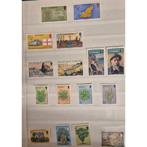 226 - Tray of seven stamp albums containing Guernsey stamps.