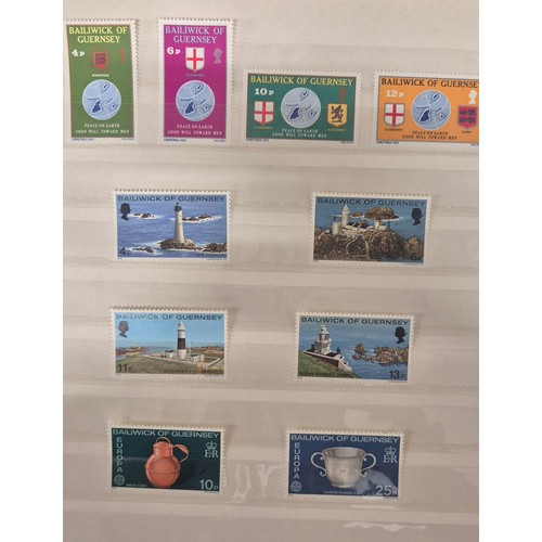 226 - Tray of seven stamp albums containing Guernsey stamps.