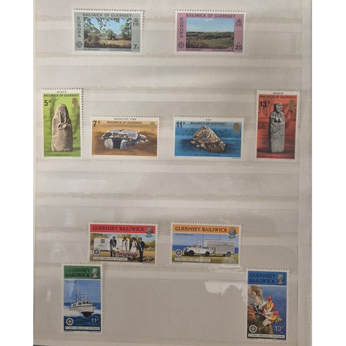 226 - Tray of seven stamp albums containing Guernsey stamps.
