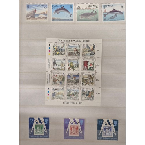 226 - Tray of seven stamp albums containing Guernsey stamps.