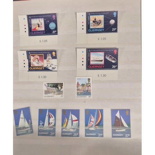 226 - Tray of seven stamp albums containing Guernsey stamps.