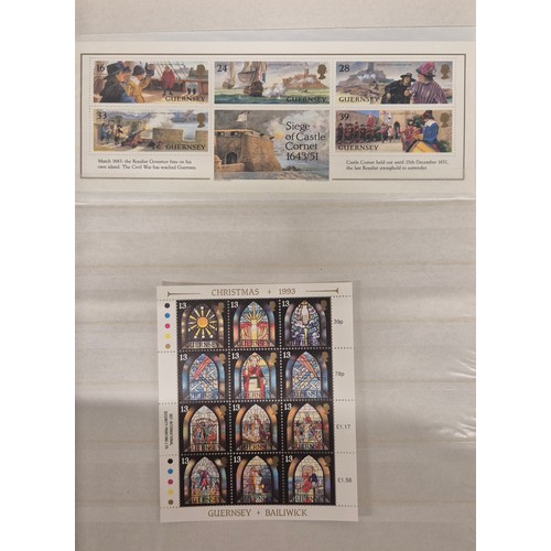 226 - Tray of seven stamp albums containing Guernsey stamps.