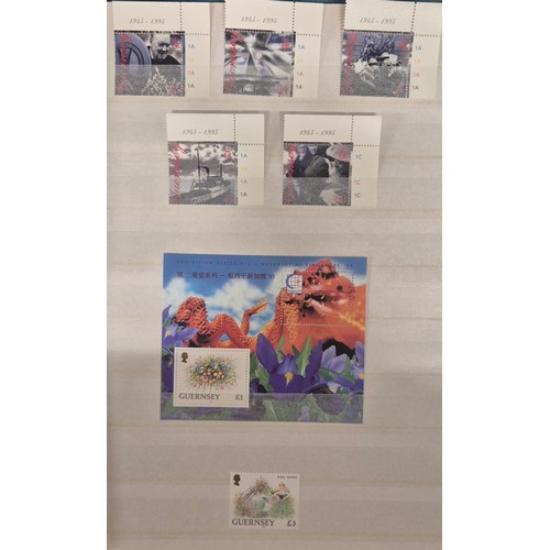 226 - Tray of seven stamp albums containing Guernsey stamps.