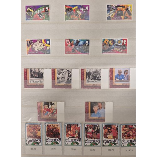 226 - Tray of seven stamp albums containing Guernsey stamps.