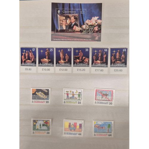 226 - Tray of seven stamp albums containing Guernsey stamps.