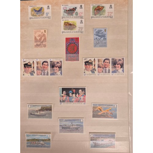 226 - Tray of seven stamp albums containing Guernsey stamps.