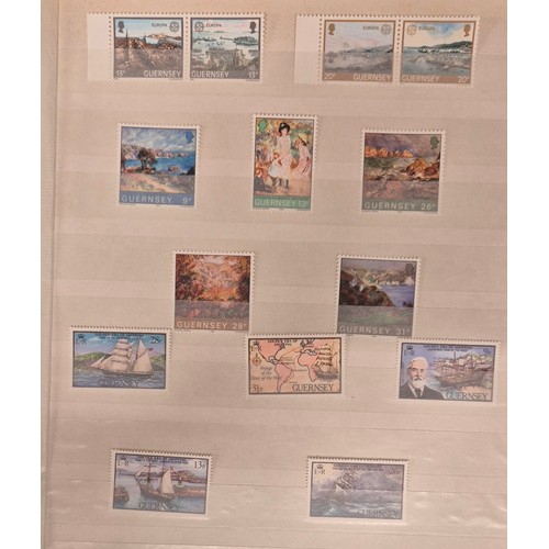 226 - Tray of seven stamp albums containing Guernsey stamps.