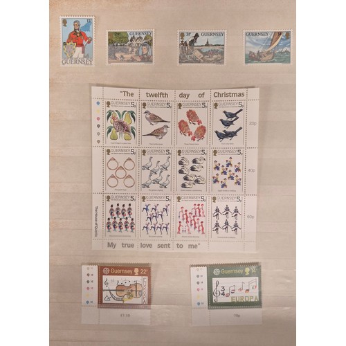 226 - Tray of seven stamp albums containing Guernsey stamps.