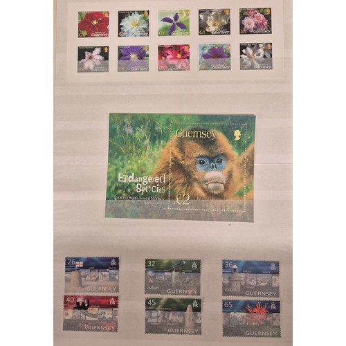 226 - Tray of seven stamp albums containing Guernsey stamps.