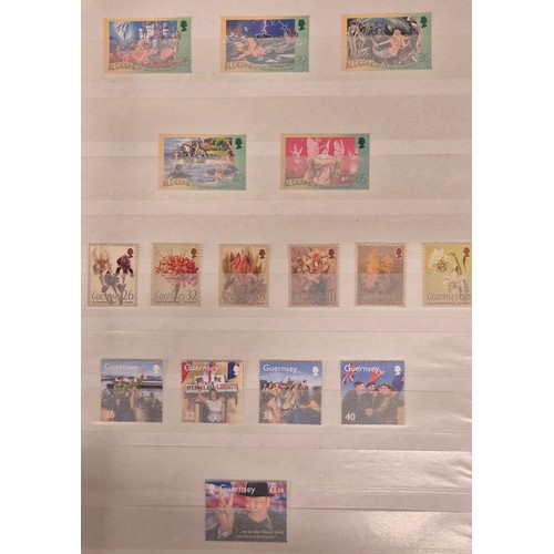 226 - Tray of seven stamp albums containing Guernsey stamps.