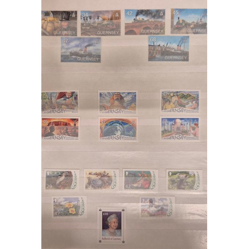226 - Tray of seven stamp albums containing Guernsey stamps.
