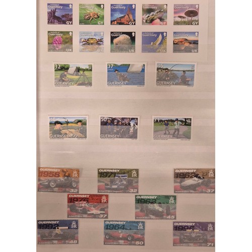 226 - Tray of seven stamp albums containing Guernsey stamps.