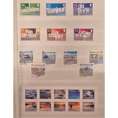 226 - Tray of seven stamp albums containing Guernsey stamps.