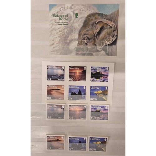 226 - Tray of seven stamp albums containing Guernsey stamps.