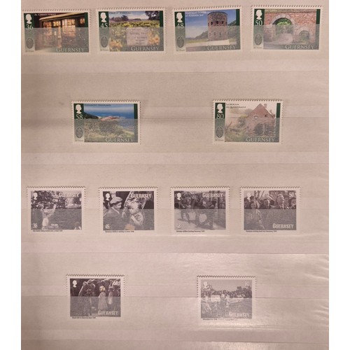 226 - Tray of seven stamp albums containing Guernsey stamps.