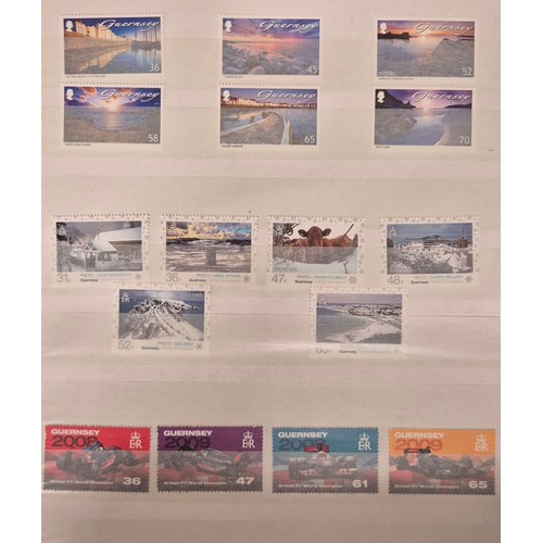226 - Tray of seven stamp albums containing Guernsey stamps.