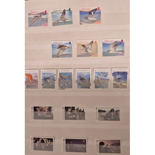 226 - Tray of seven stamp albums containing Guernsey stamps.