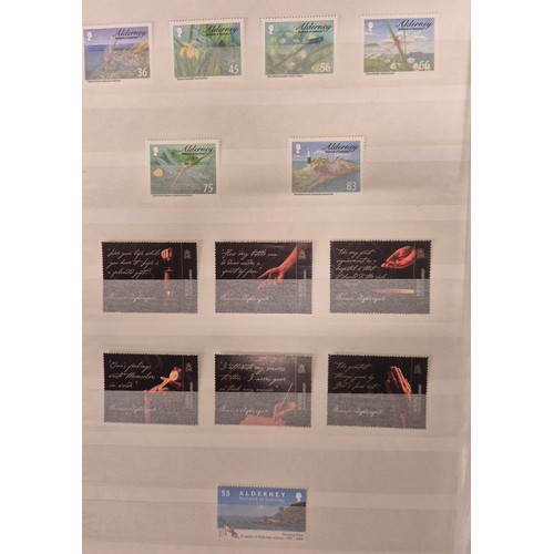 226 - Tray of seven stamp albums containing Guernsey stamps.