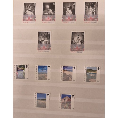 226 - Tray of seven stamp albums containing Guernsey stamps.