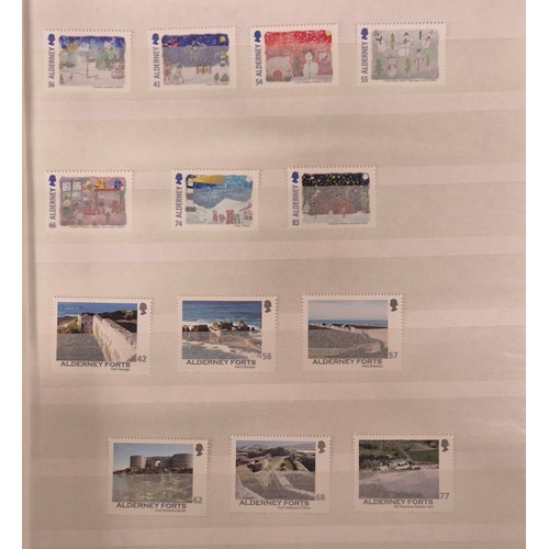 226 - Tray of seven stamp albums containing Guernsey stamps.