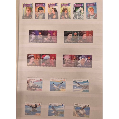 226 - Tray of seven stamp albums containing Guernsey stamps.