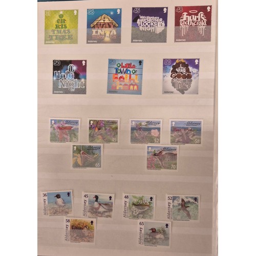 226 - Tray of seven stamp albums containing Guernsey stamps.