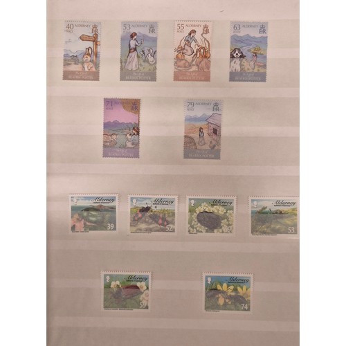 226 - Tray of seven stamp albums containing Guernsey stamps.